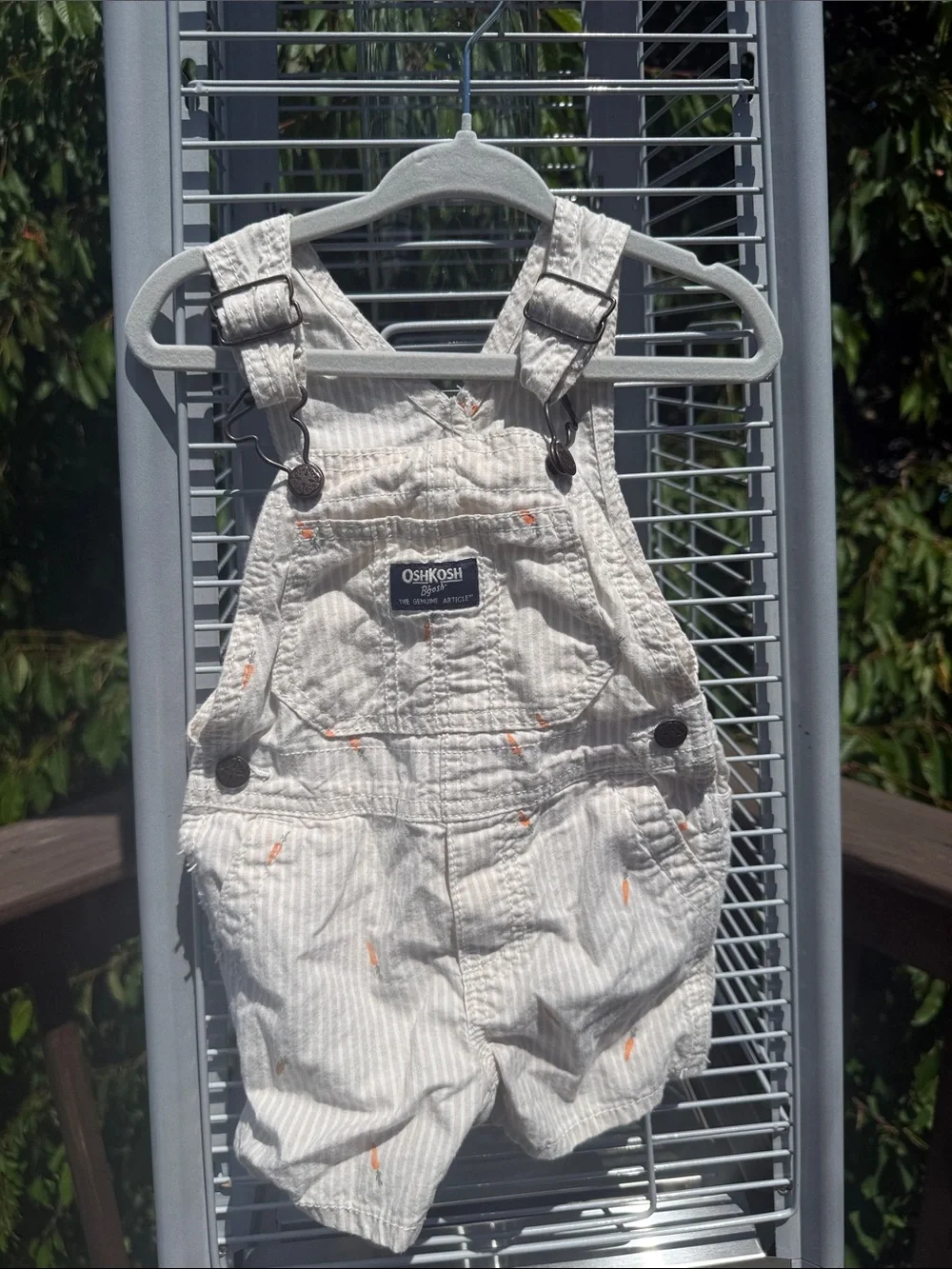 OshKosh B'gosh Cream and Light Gray Striped Short Overalls with Orange Carrots
